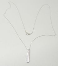 A 9ct white gold and diamond pendant on a fine 9ct gold chain, 1.4g