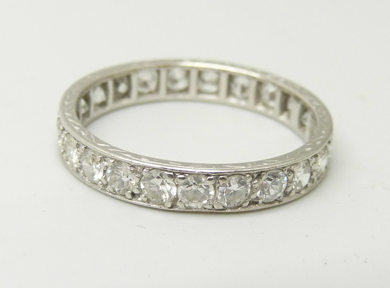 A white metal eternity ring set with approximately 2ct of diamonds, 3.2g, P - Image 2 of 3