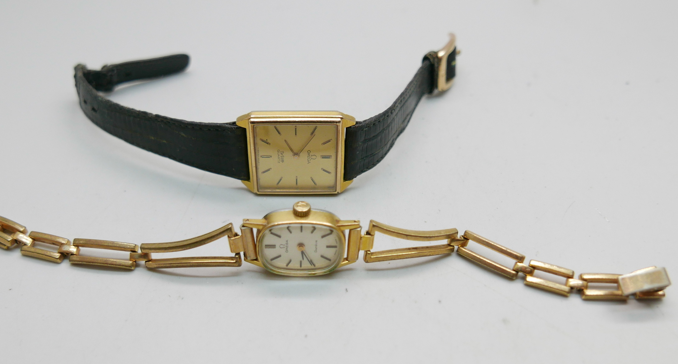 A lady's Omega wristwatch wtih a midi Omega DeVille quartz wristwatch