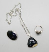 Three pieces of silver set Blue John jewellery, a ring, size J, a brooch and a pendant on a silver