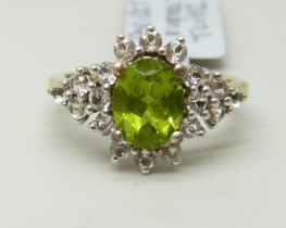 A silver gilt, peridot and topaz cluster ring, P