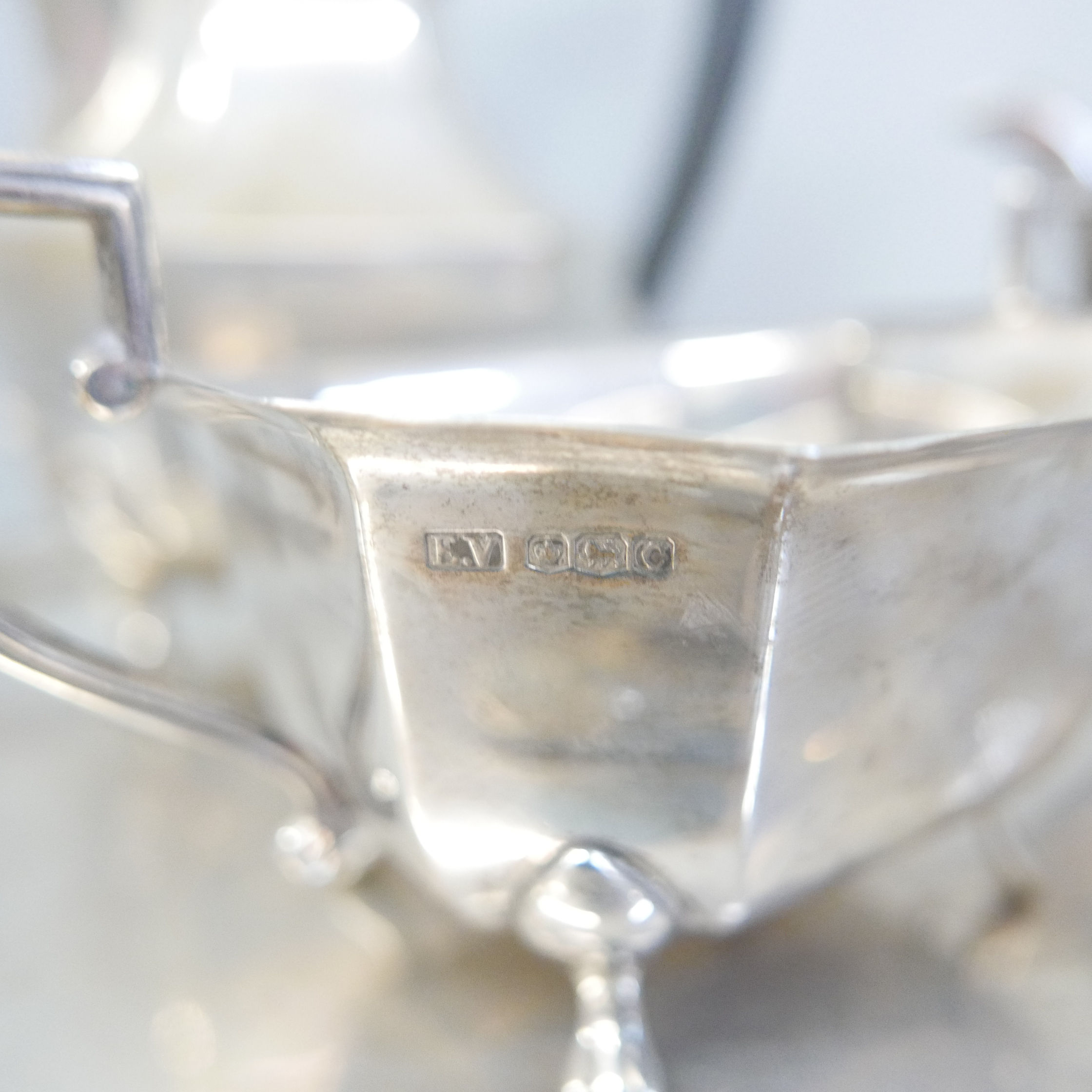 A silver four piece tea service, two handled tray and a pair of silver sugar bows, Sheffield 1945 - Image 2 of 7