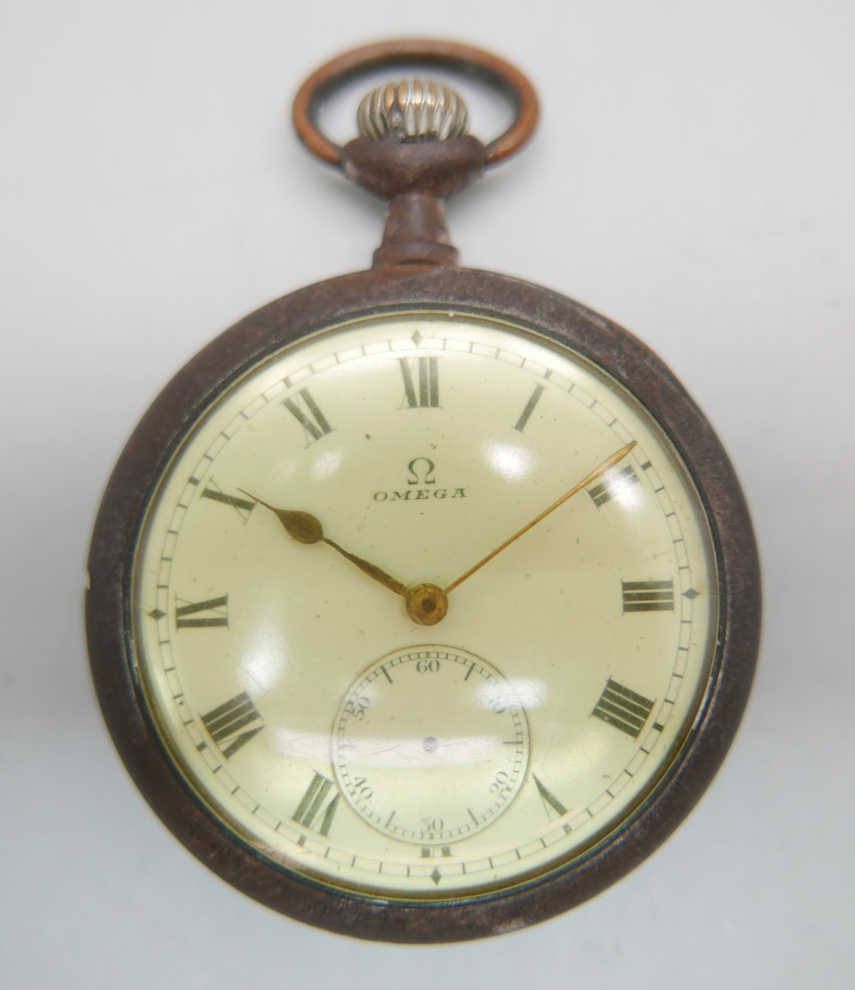 An Omega pocket watch, lacking second hand