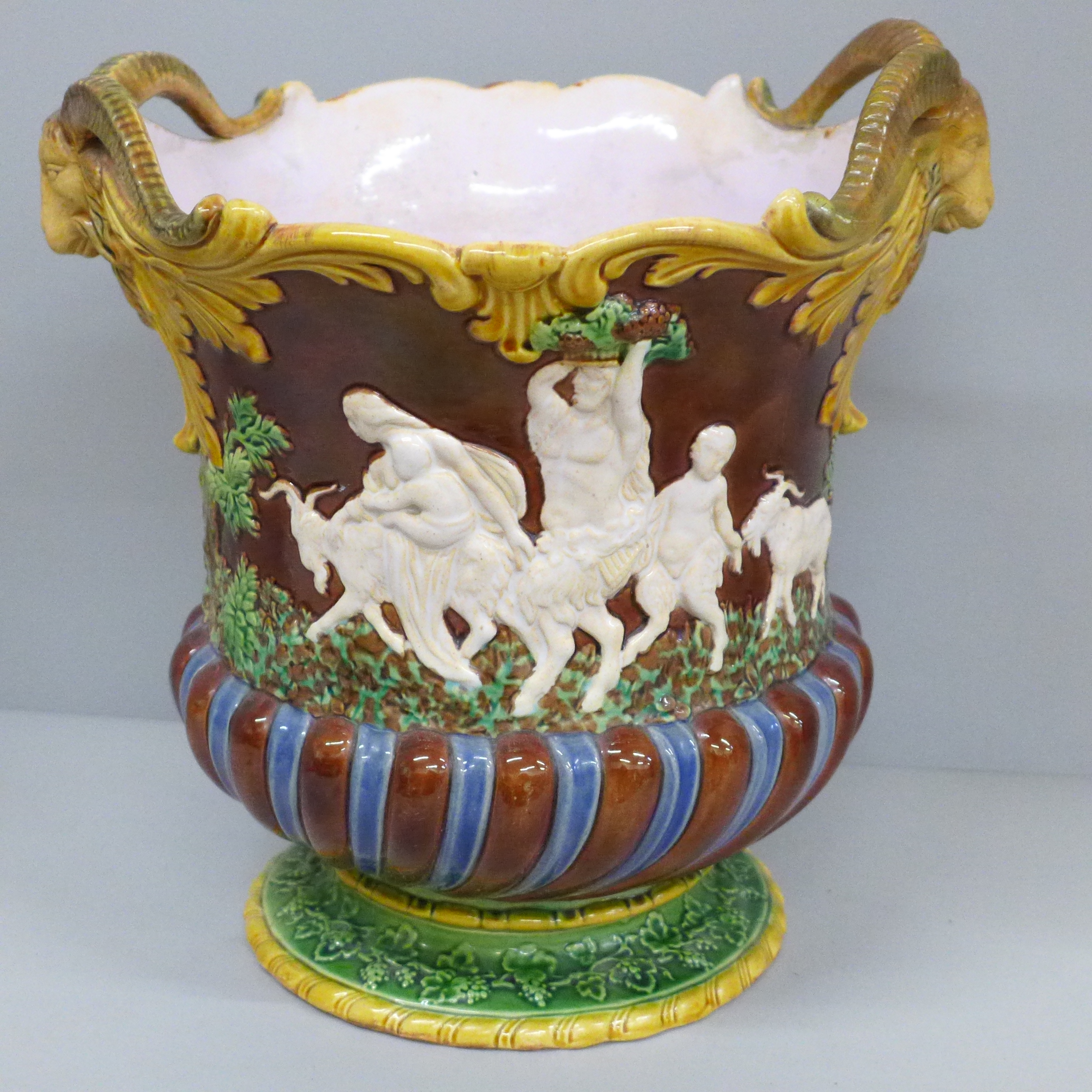 A 19th Century majolica jardinière with ram's head detail and embossed with classical Roman - Image 4 of 6