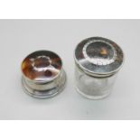 Two silver and tortoiseshell topped jars/pots, (glass jar 5cm)
