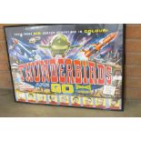 A framed Thunderbirds Are Go promotional print of the 1966 David Lane movie (size 70 x 50cm)