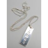 A silver ingot pendant and chain, 45g, chain 68cm
