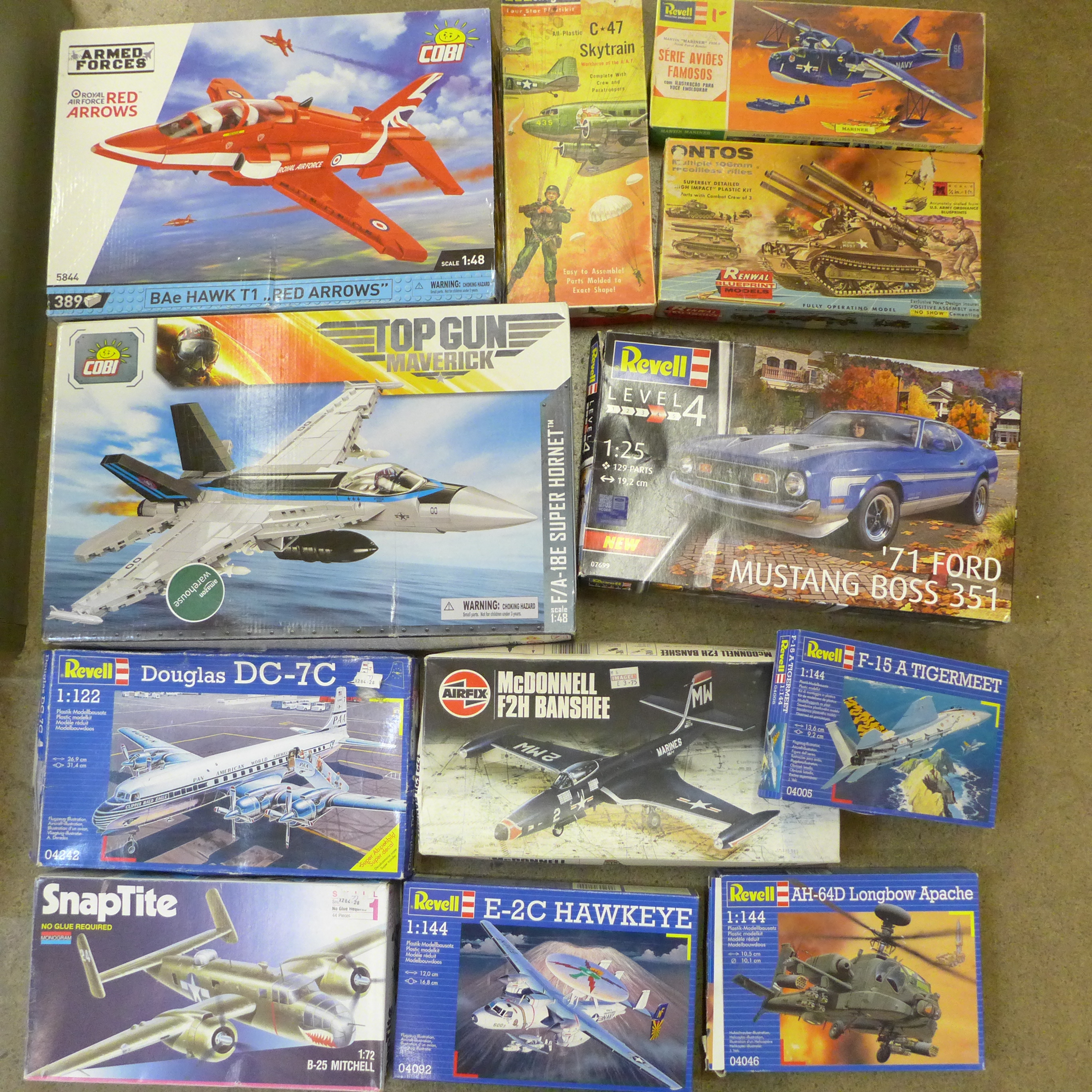 A collection of model aircraft and motor car kits, Revell, Airfix, and Monogram, etc.