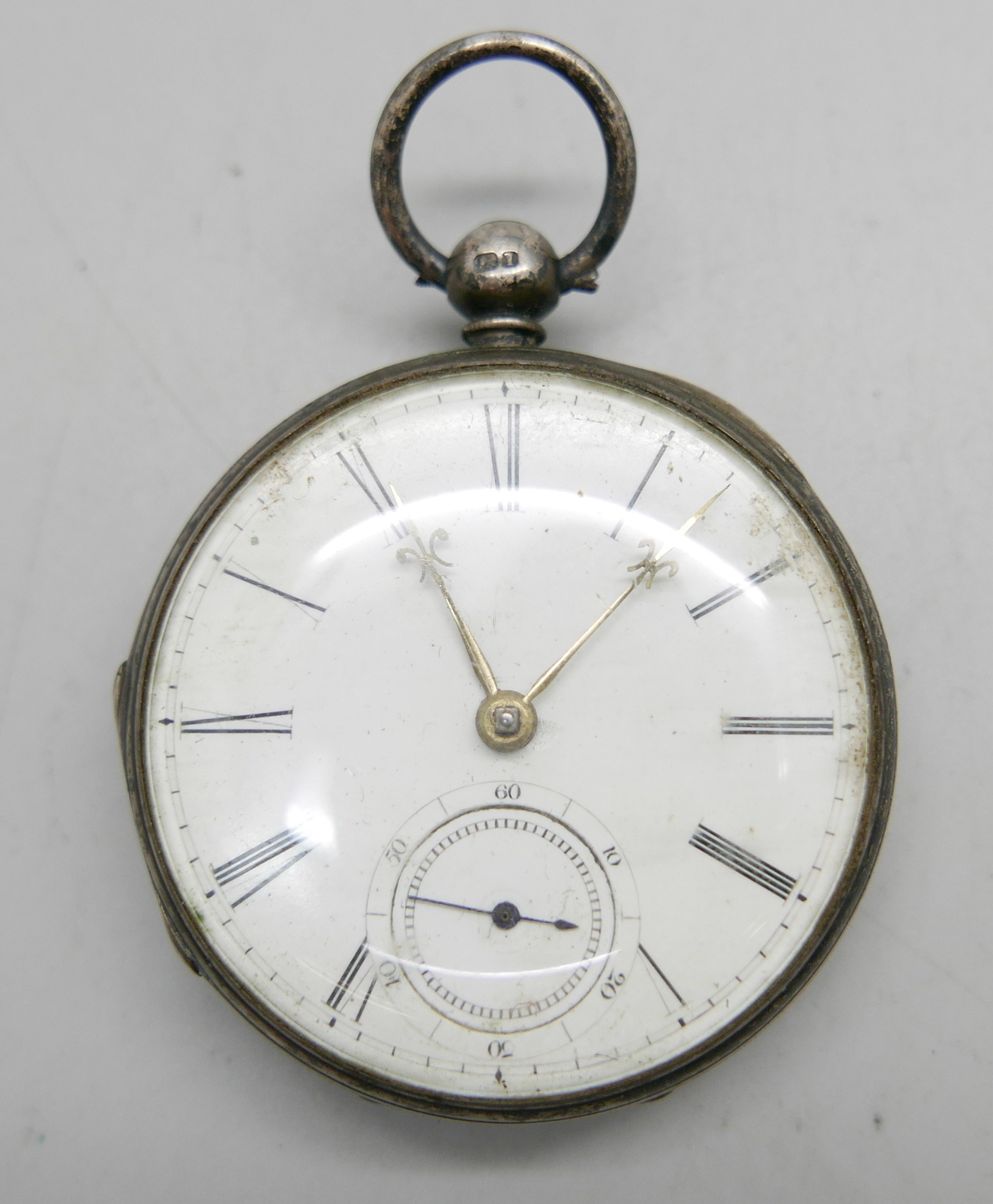 A silver pocket watch, London 1857