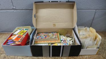 A collection of stamps, loose stamps and matchbox covers **PLEASE NOTE THIS LOT IS NOT ELIGIBLE