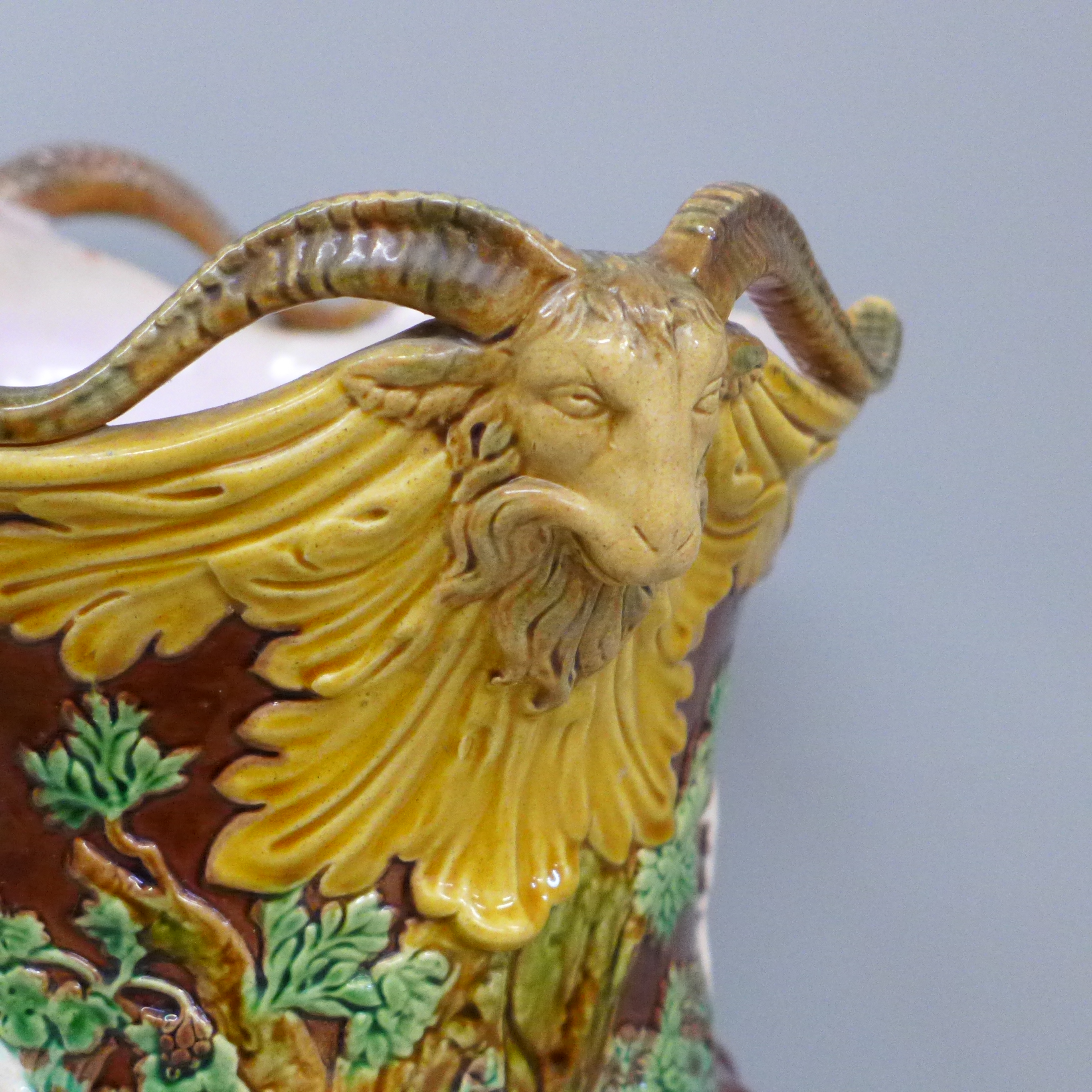 A 19th Century majolica jardinière with ram's head detail and embossed with classical Roman - Image 3 of 6