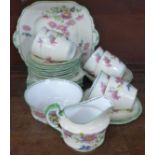 An Aynsley hand painted floral part tea set, four cups a/f