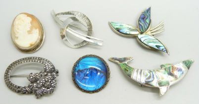 Six silver brooches