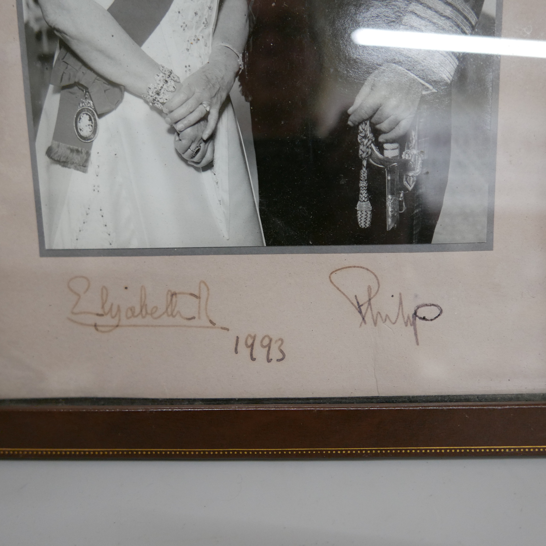 A Queen Elizabeth II and Prince Philip black and white photograph with a leather frame, 1993 - Image 2 of 4