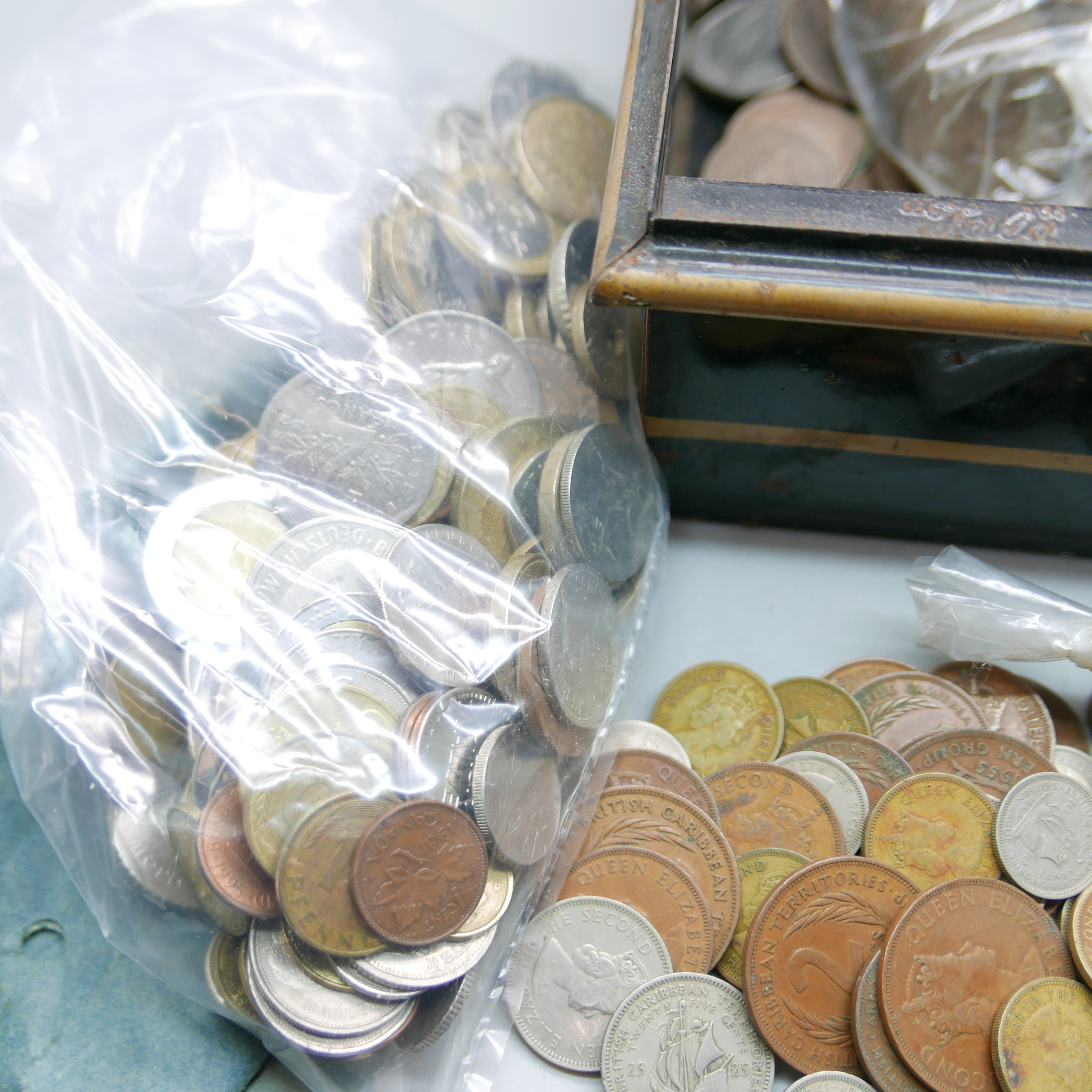 A tin box with a collection of foreign and English coins and notes - Image 4 of 5