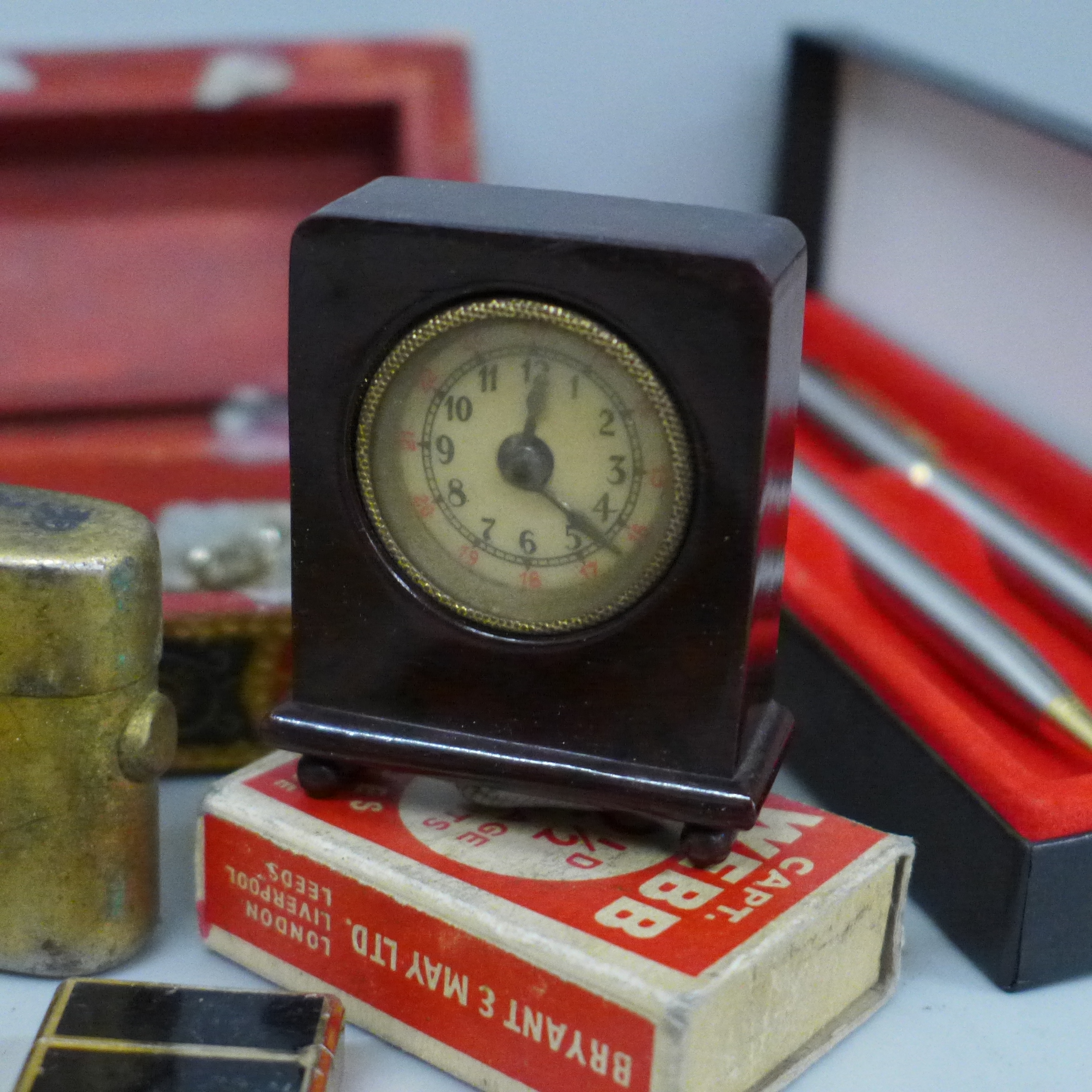 A novelty Bakelite clock read out tape measure, lighters, a travel inkwell, two Georgian buckles, - Image 5 of 7