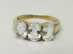 A silver gilt rock crystal trilogy ring, L