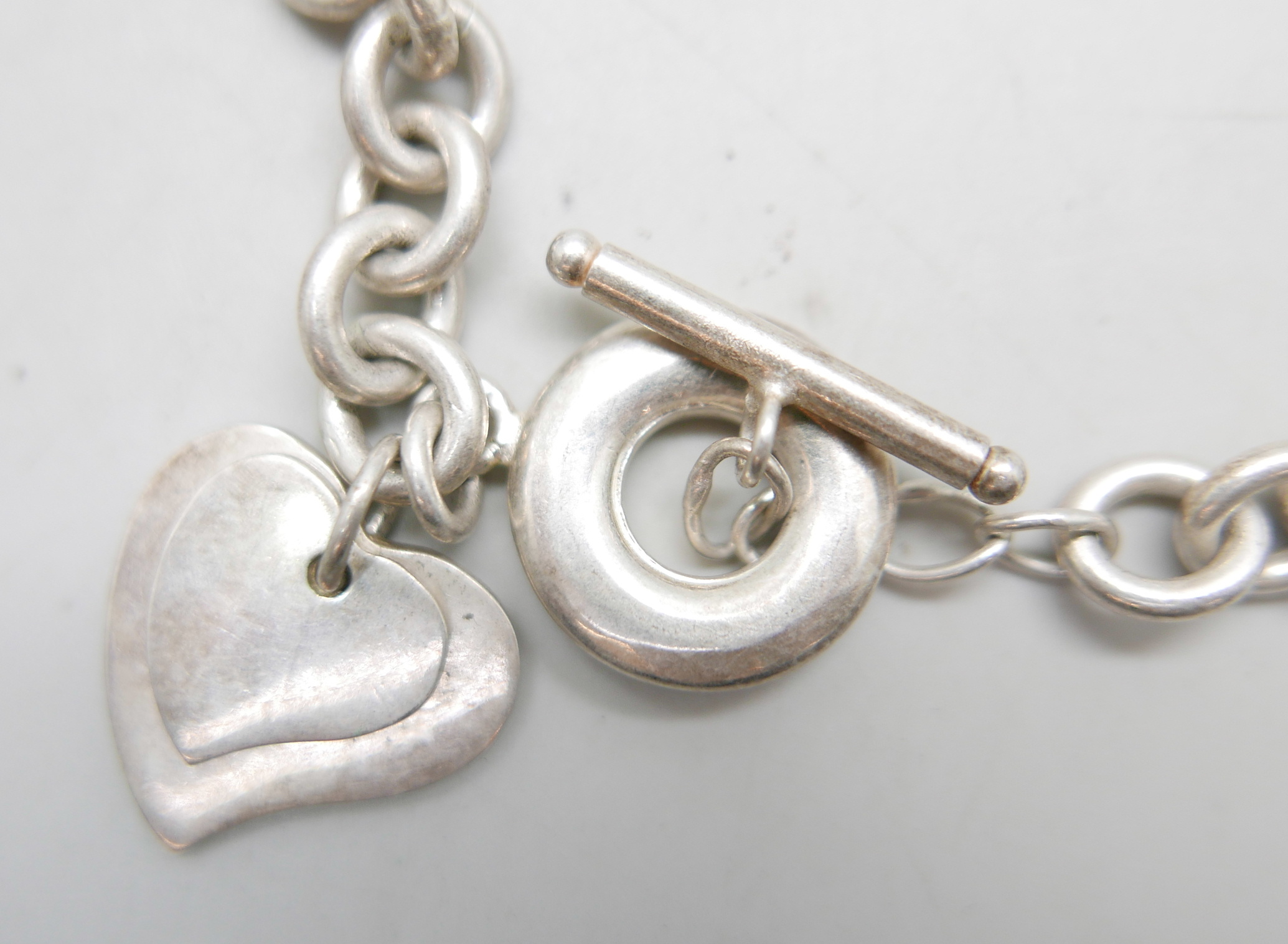 A silver heart, T-bar necklace and a silver bracelet, 77g - Image 2 of 4