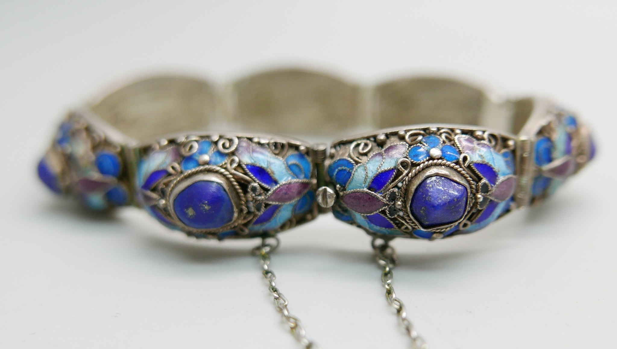 A Chinese vintage enamelled silver bracelet with blue stones