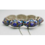 A Chinese vintage enamelled silver bracelet with blue stones