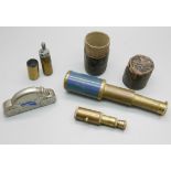 A brass trench art type lighter, a pocket telescope, with case, and one other small telescope and