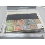 Stamps; an album of better stamps and sets on stock cards, all identified and catalogued at over £