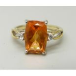 A silver gilt and sunstone ring, Q