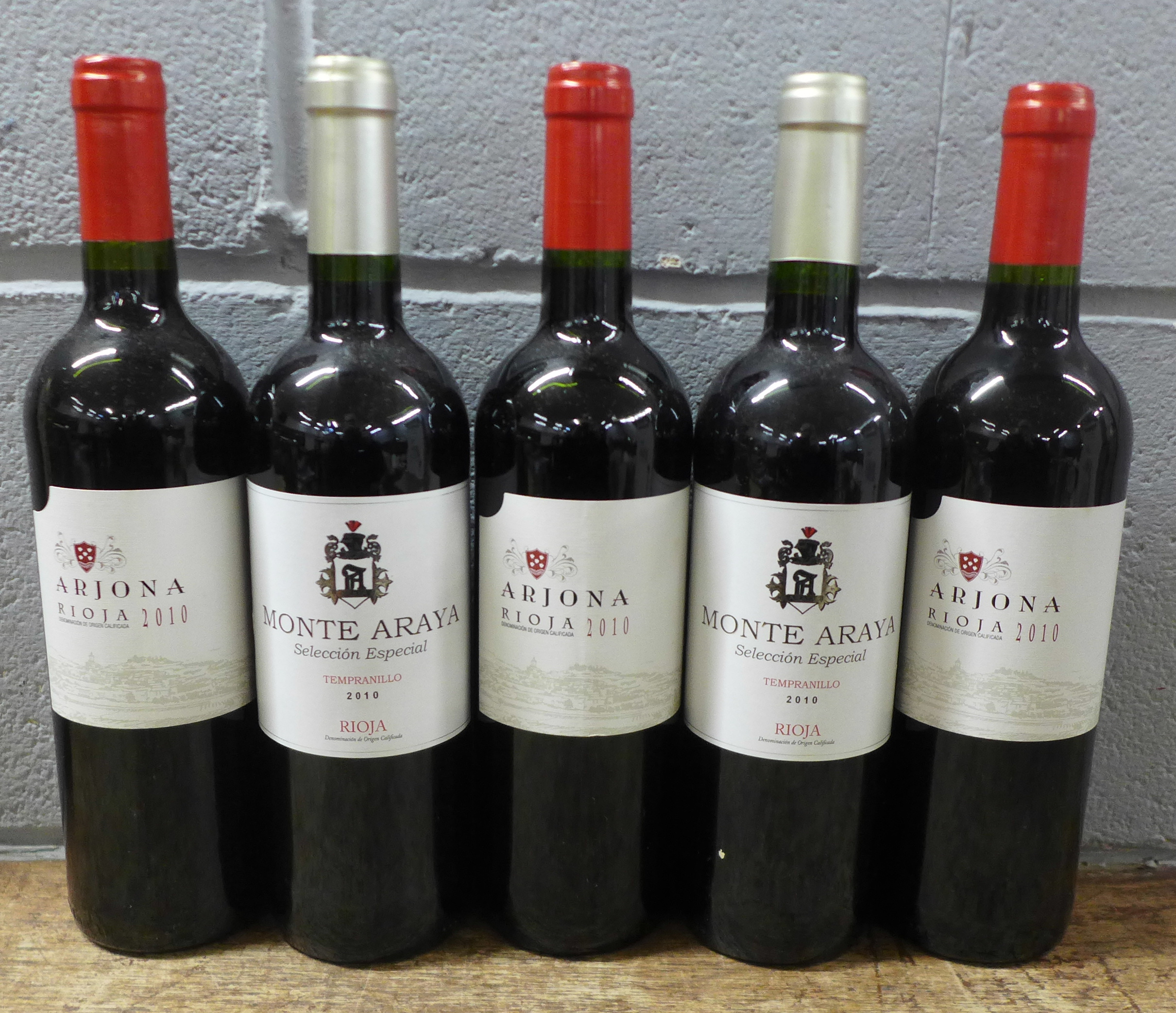 Five bottles of Rioja, two Monte Araya Selection Especial, 2010 and three Arjona 2010