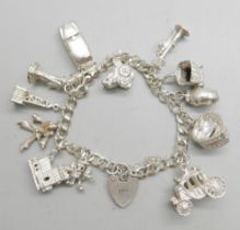 A silver charm bracelet, 50g