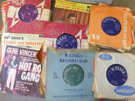 A box of 7" singles, mainly 1960s and 1970s including The Beatles, Rolling Stones, Elvis Presley,