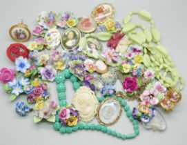 A collection of floral themed jewellery, two Limoges pieces, one vintage blue necklace, Denton china