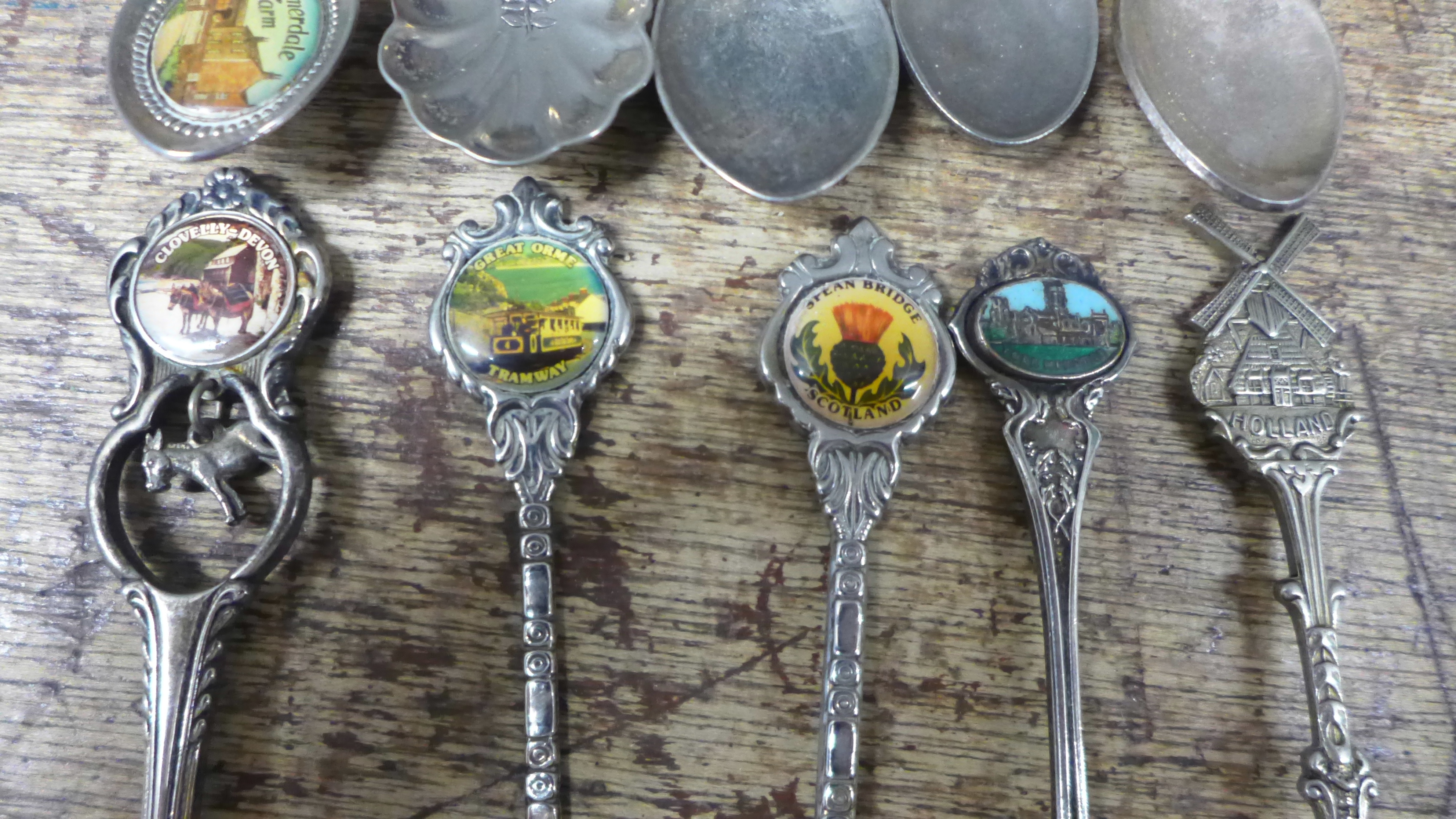 A collection of collectors spoons and a set of brass weights plus a gold plated brooch **PLEASE NOTE - Image 5 of 6