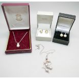 Two silver and cultured pearl necklaces and two pairs of cultured pearl earrings