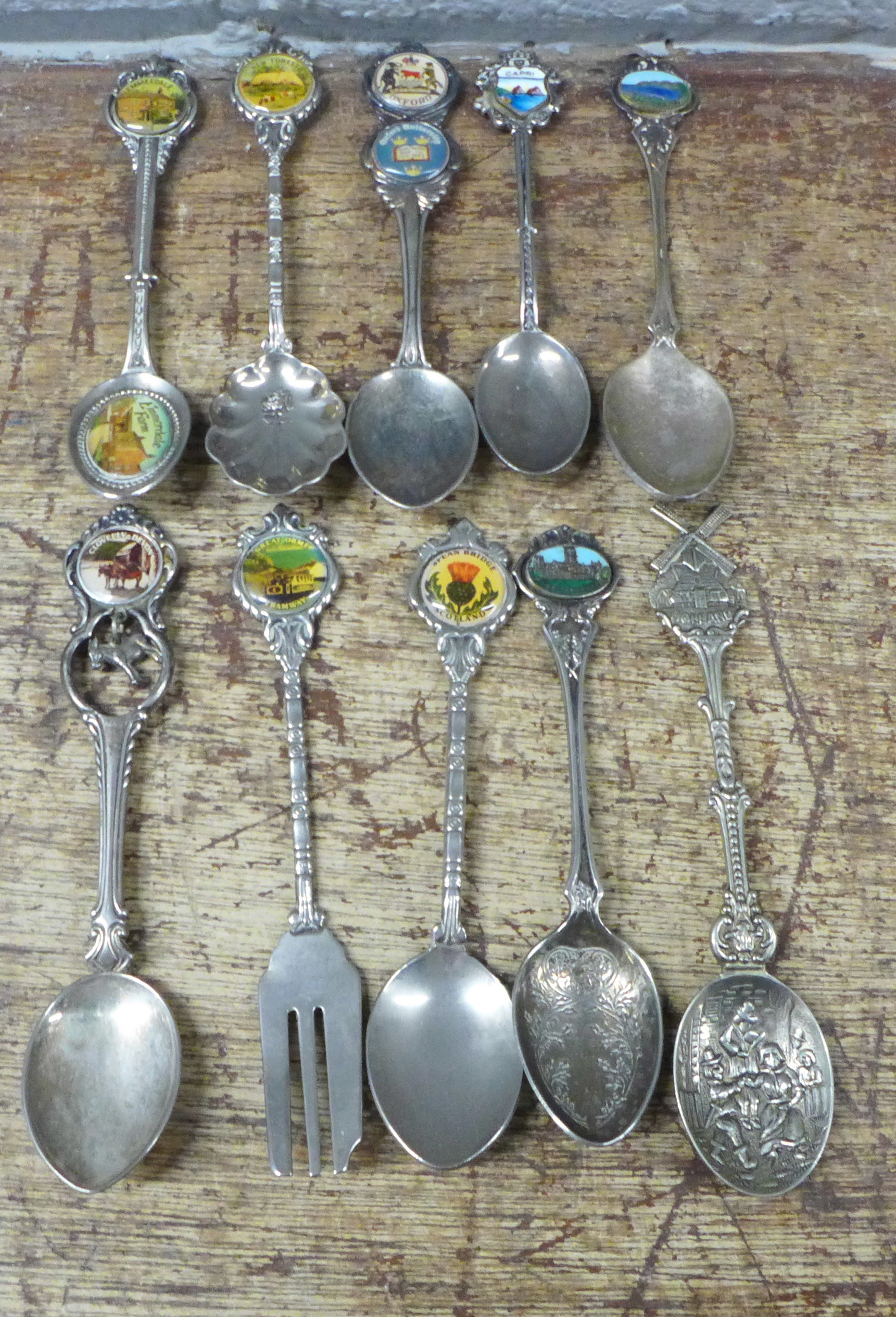A collection of collectors spoons and a set of brass weights plus a gold plated brooch **PLEASE NOTE - Image 4 of 6