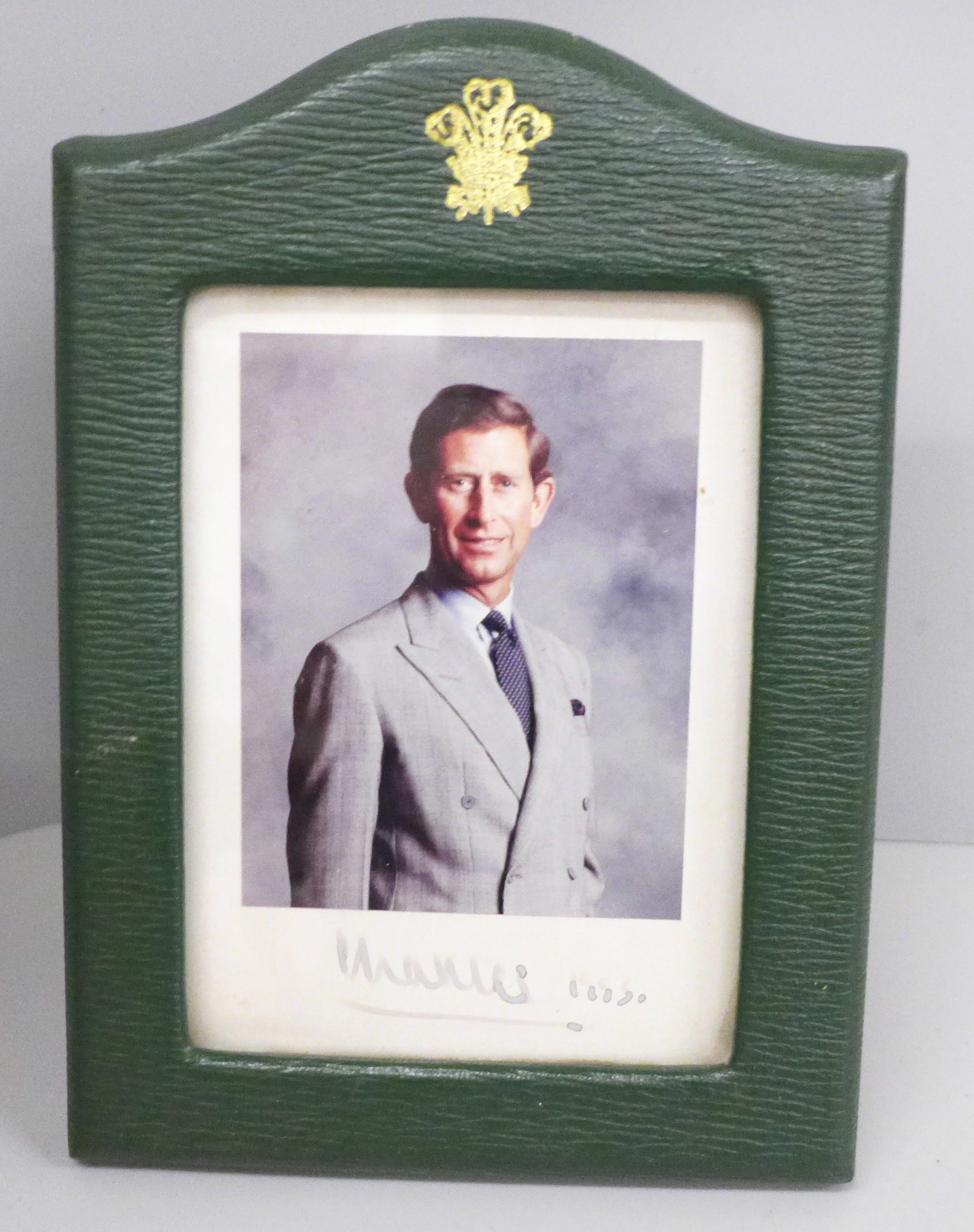 King Charles III, a coloured photograph signed in ink 'Charles 1993' presented in green Moroccan