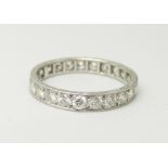 A white metal eternity ring set with approximately 2ct of diamonds, 3.2g, P