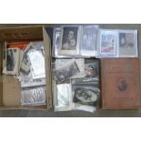 A collection of vintage postcards and album and one volume, The Pickwick Papers with plates