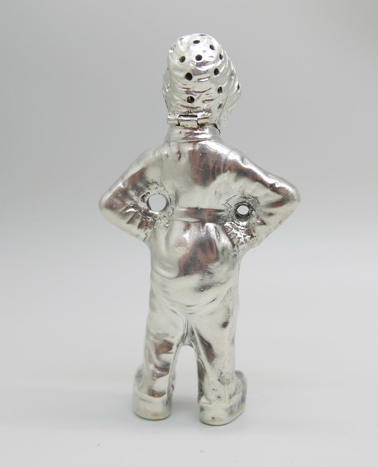 A novelty continental silver pepper modelled as a young Dutch boy, marked HH, possibly Herbert - Image 2 of 5