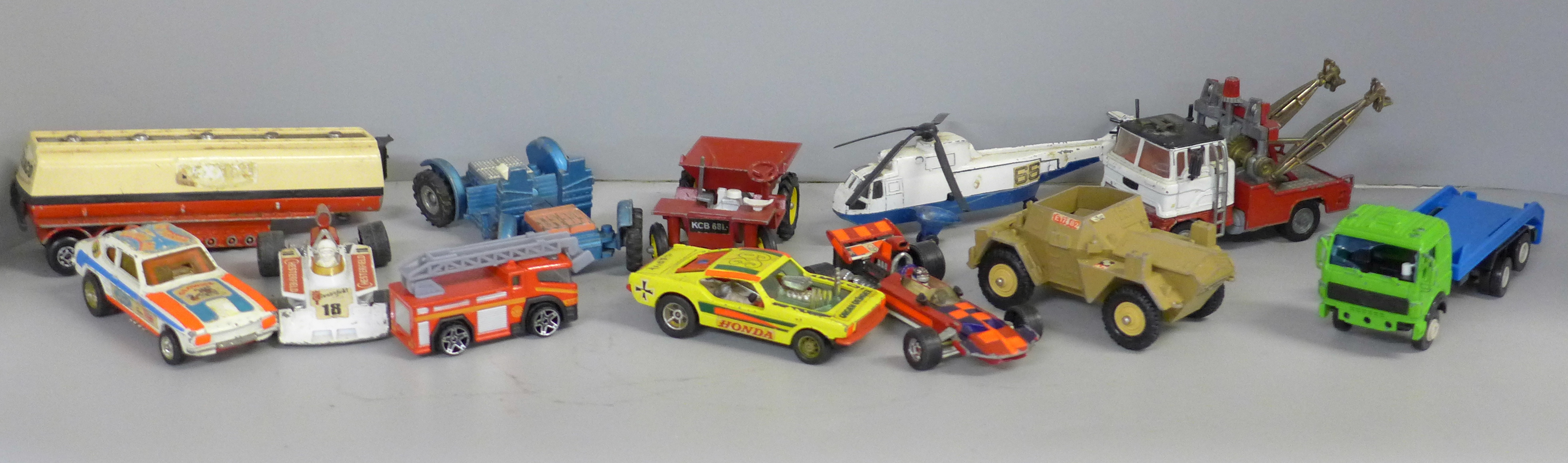 A collection of Dinky, Corgi and Matchbox vehicles, playworn