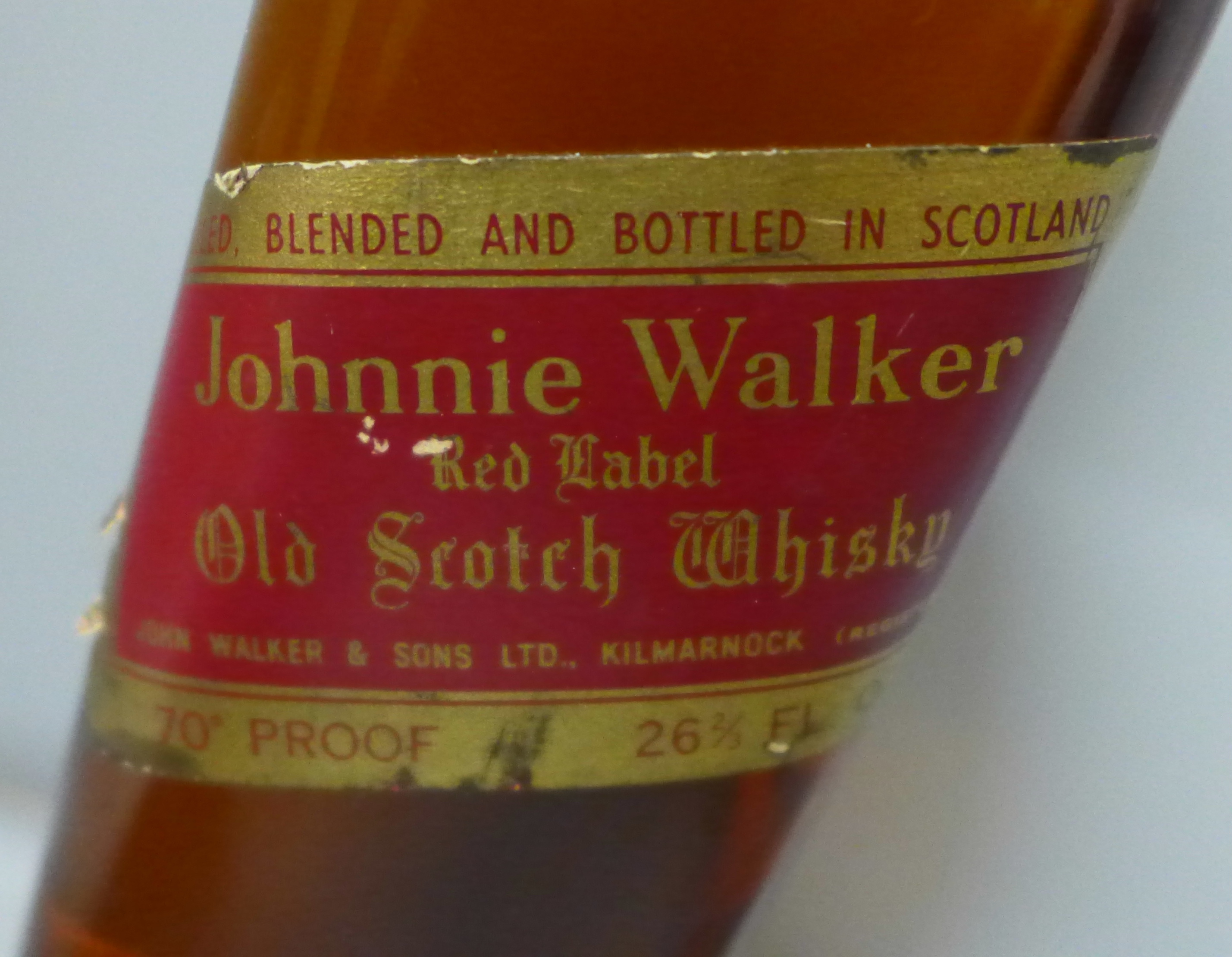 A bottle of Johnnie Walker Red Label Old Scotch Whisky, SB994S16 UCB raised backstamp (in vendor's - Image 2 of 4