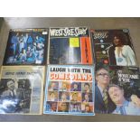 A collection of 35 LP records; West Side Story, Bond Movies Soundtrack, Top of The Pops, etc.