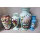 Three hand painted opaline glass vases and one large 19th Century blue glass vase decorated with