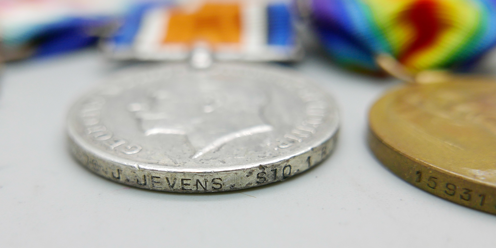 Three WWI medals; Victory medal to 159319 Gnr. E.G. James RA, a British War Medal to K. 1270 J. - Image 3 of 5