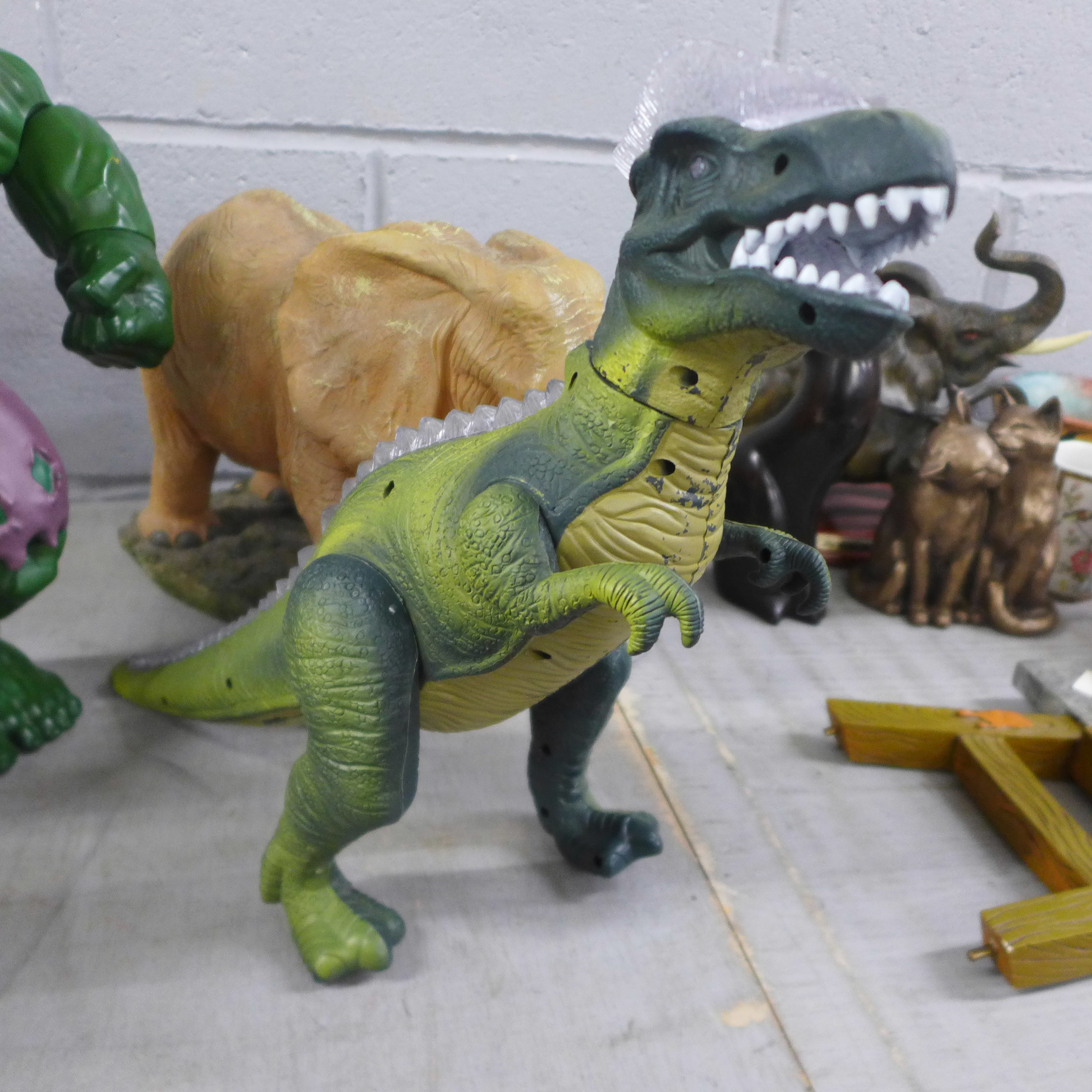A collection of figures, a toy dinosaur and other ornaments **PLEASE NOTE THIS LOT IS NOT ELIGIBLE - Image 4 of 6