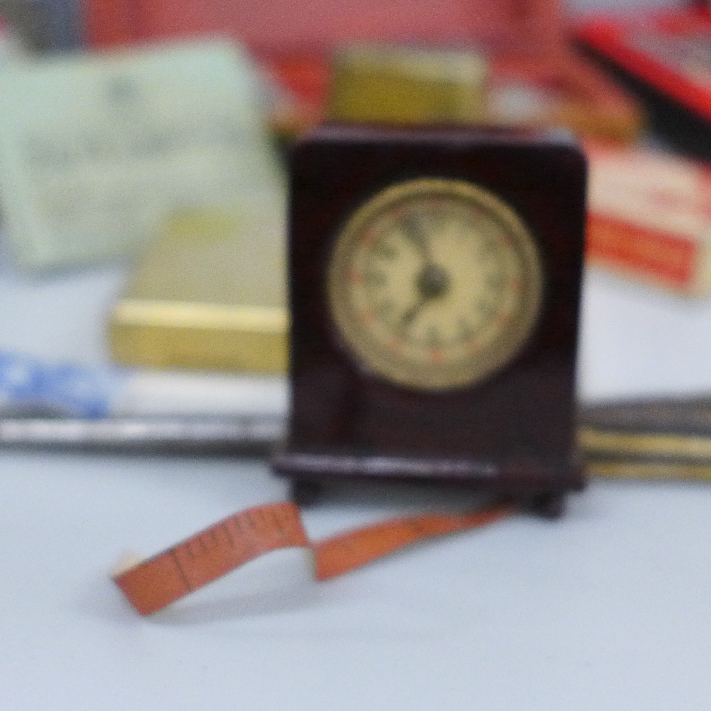 A novelty Bakelite clock read out tape measure, lighters, a travel inkwell, two Georgian buckles, - Image 6 of 7