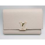 A lady's Louis Vuitton purse, boxed
