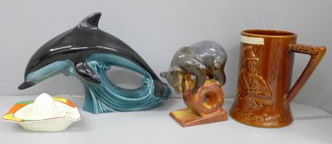A musical hunting theme mug, an Art Deco lemon squeezer, an USSR model of a bear and a Poole pottery