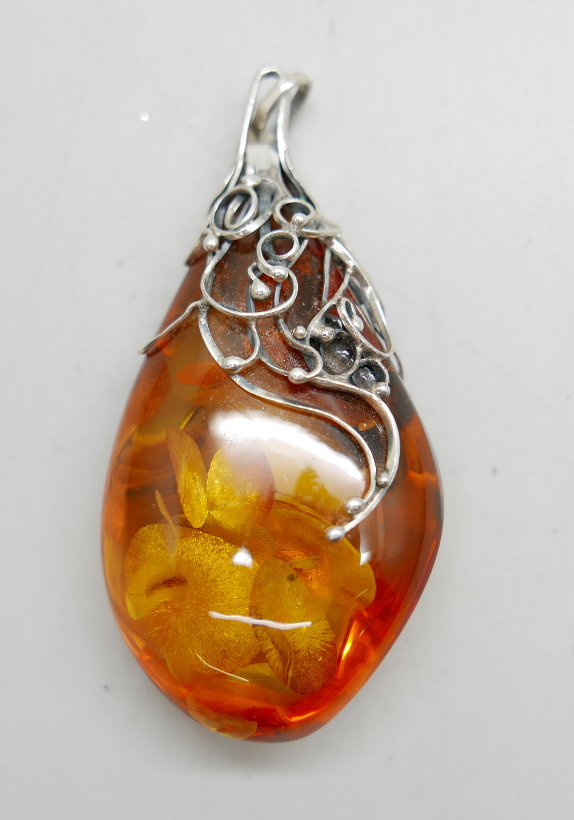 A large silver and amber pendant and chain, 9cm with the loop - Image 2 of 4