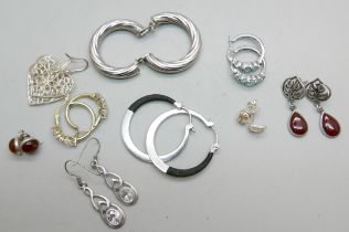 Nine pairs of silver and silver gilt earrings including Emporio Armani