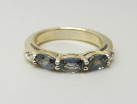A silver gilt, colour change andesine and topaz ring, L